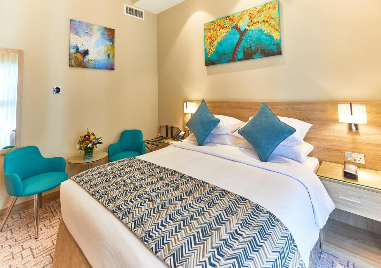 Chambre Lit King-Size Classique - Départ Tardif à 14h00