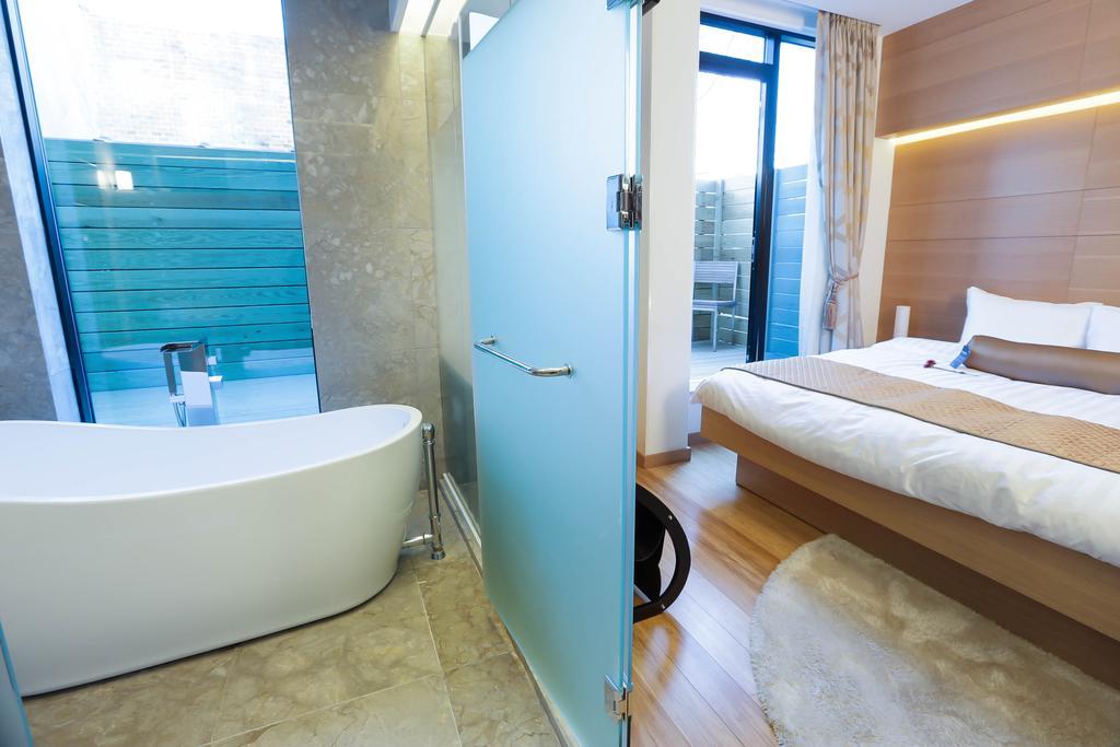 Chambre Lit King-Size avec Baignoire Spa