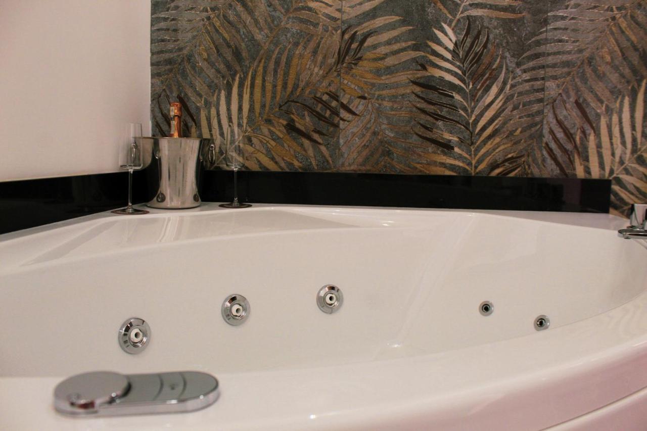 Chambre Lit King-Size avec Baignoire Spa