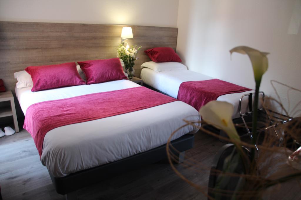 Chambre Triple (1 Lit Double et 1 Lit Simple)