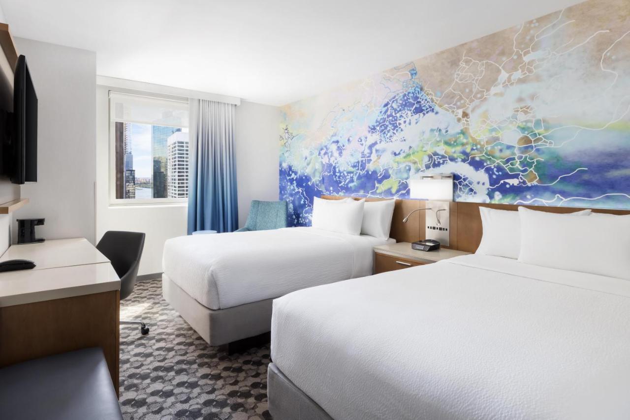 Grande Chambre Deluxe avec 2 Lits Doubles - Vue sur Ville