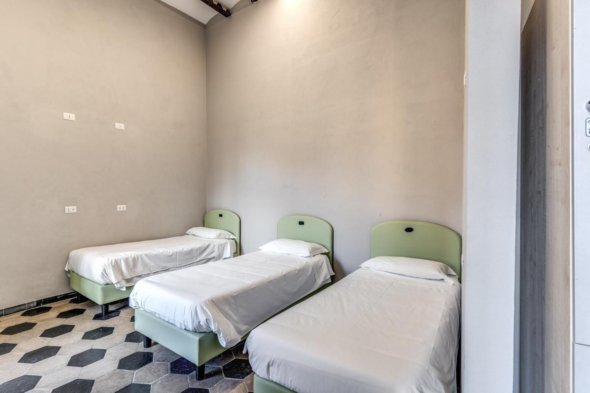 Chambre Quadruple avec Salle de Bains Commune