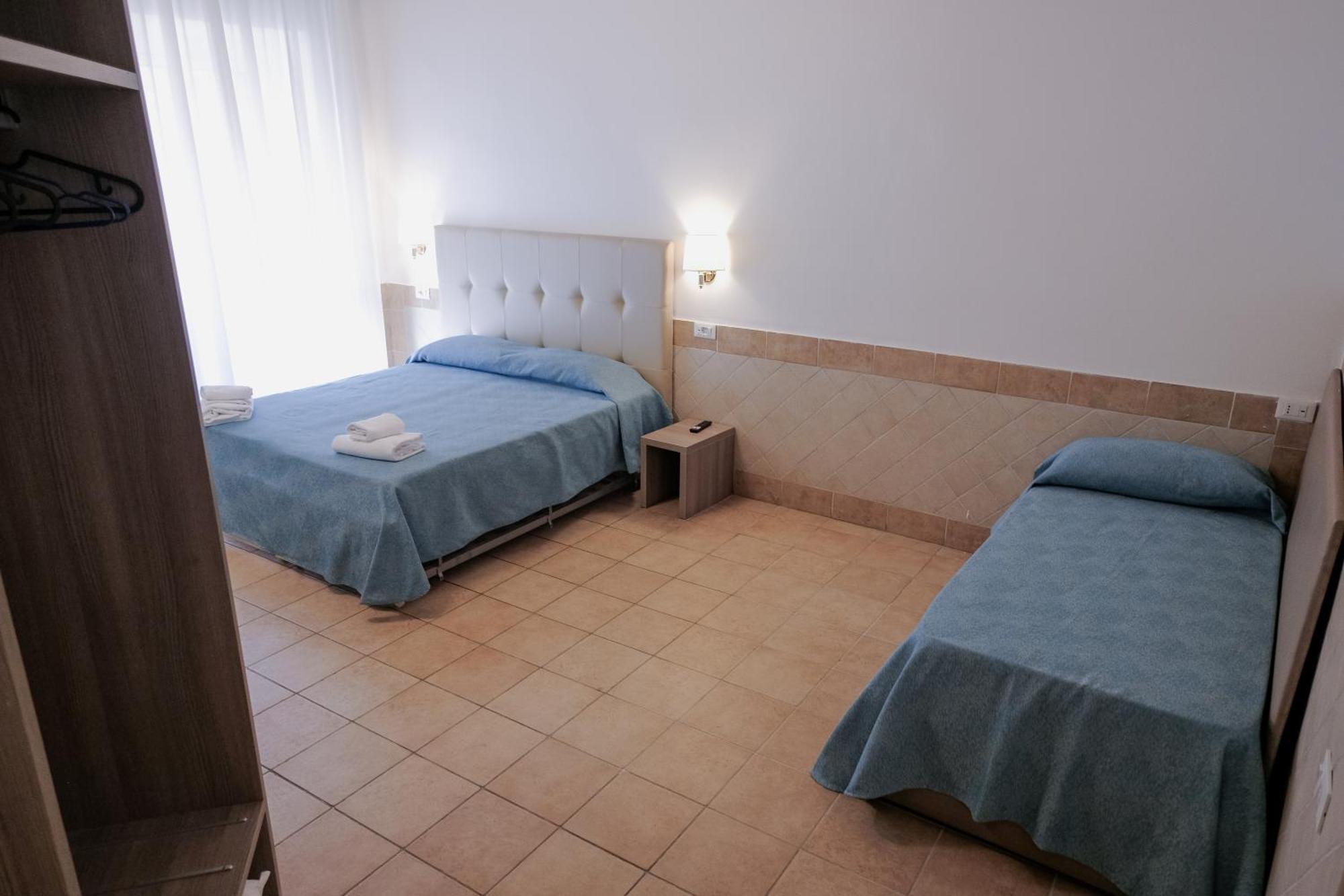 Chambre Triple avec Salle de Bains Privative