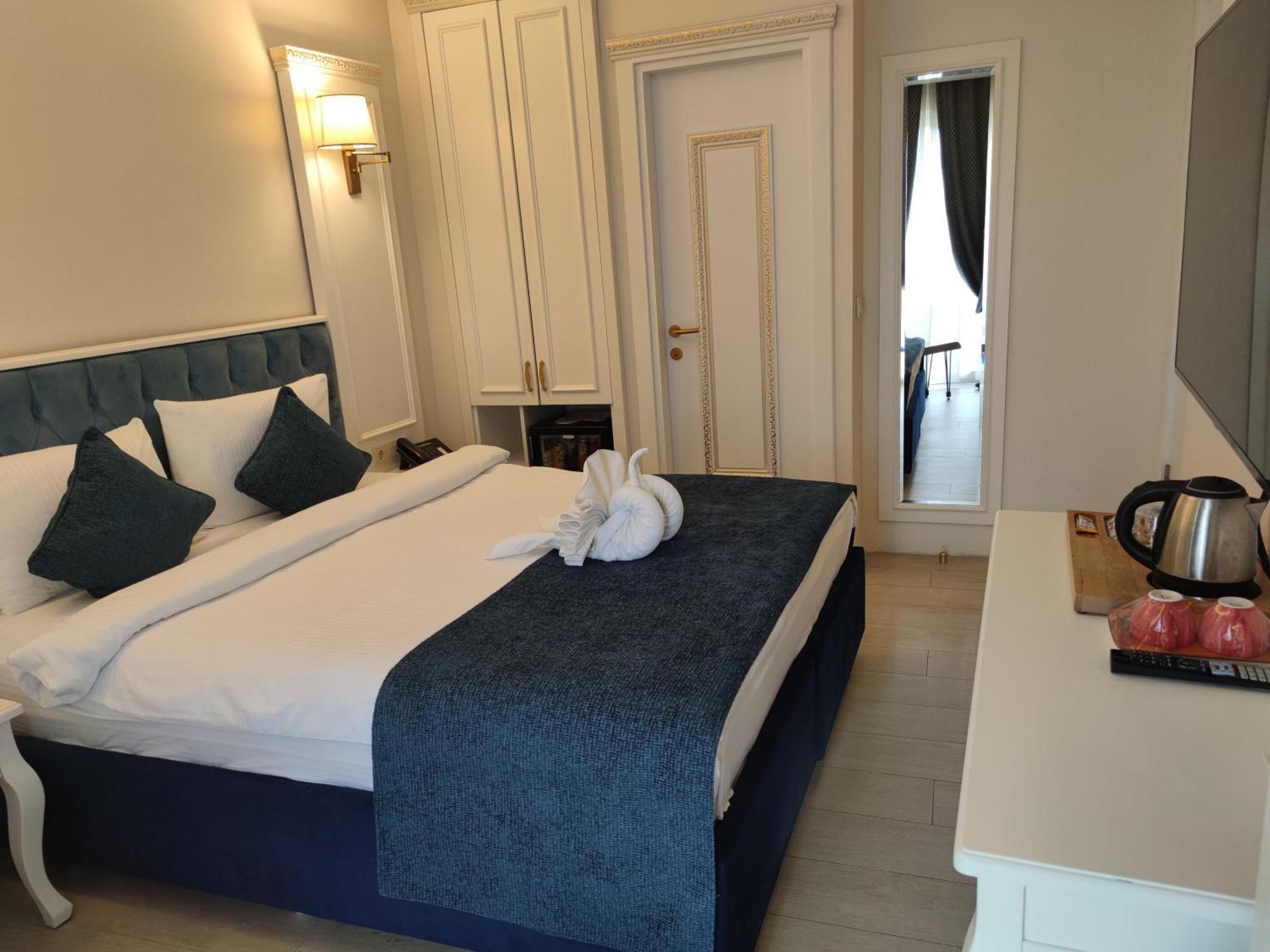 Chambre Double Deluxe - Vue Latérale sur Mer