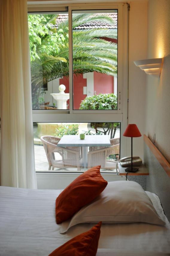Chambre Lits Jumeaux Côté Patio