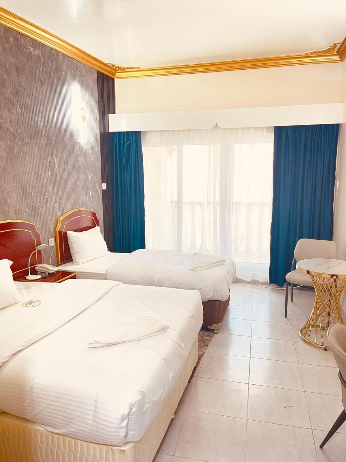 Chambre Double Deluxe (2 Adultes + 1 Enfant)