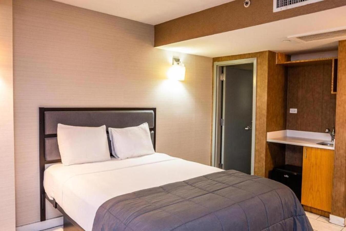 Chambre Lit Queen-Size Deluxe