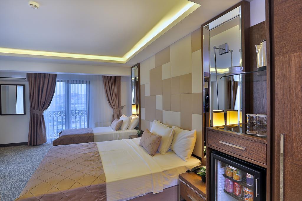 Chambre Triple Deluxe - Vue sur Mer