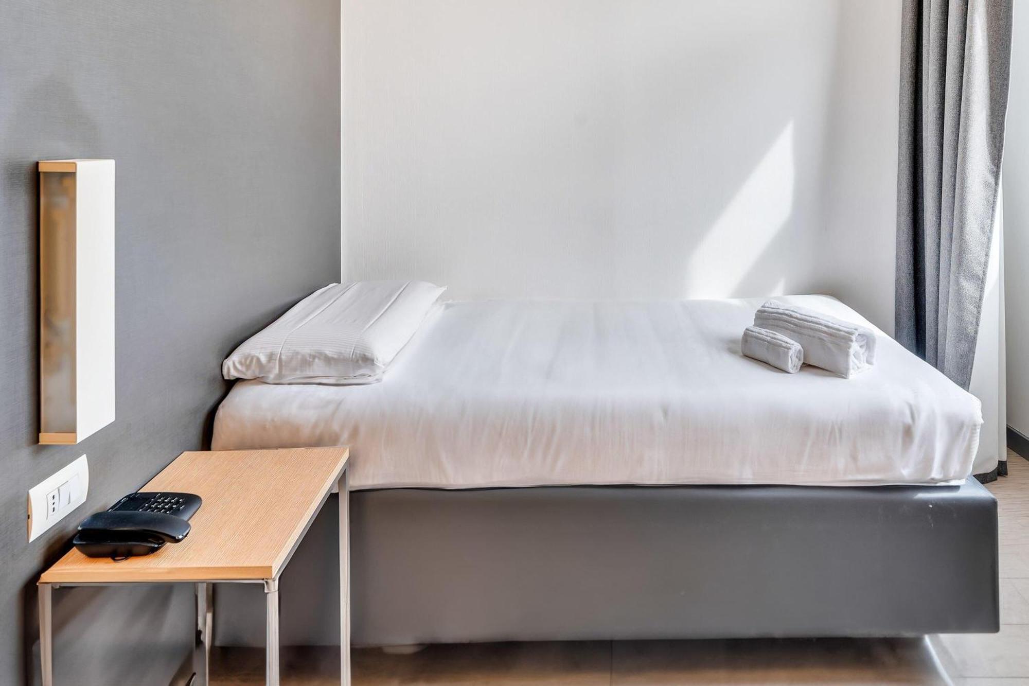 Chambre Lit Queen-Size (1 Adulte)