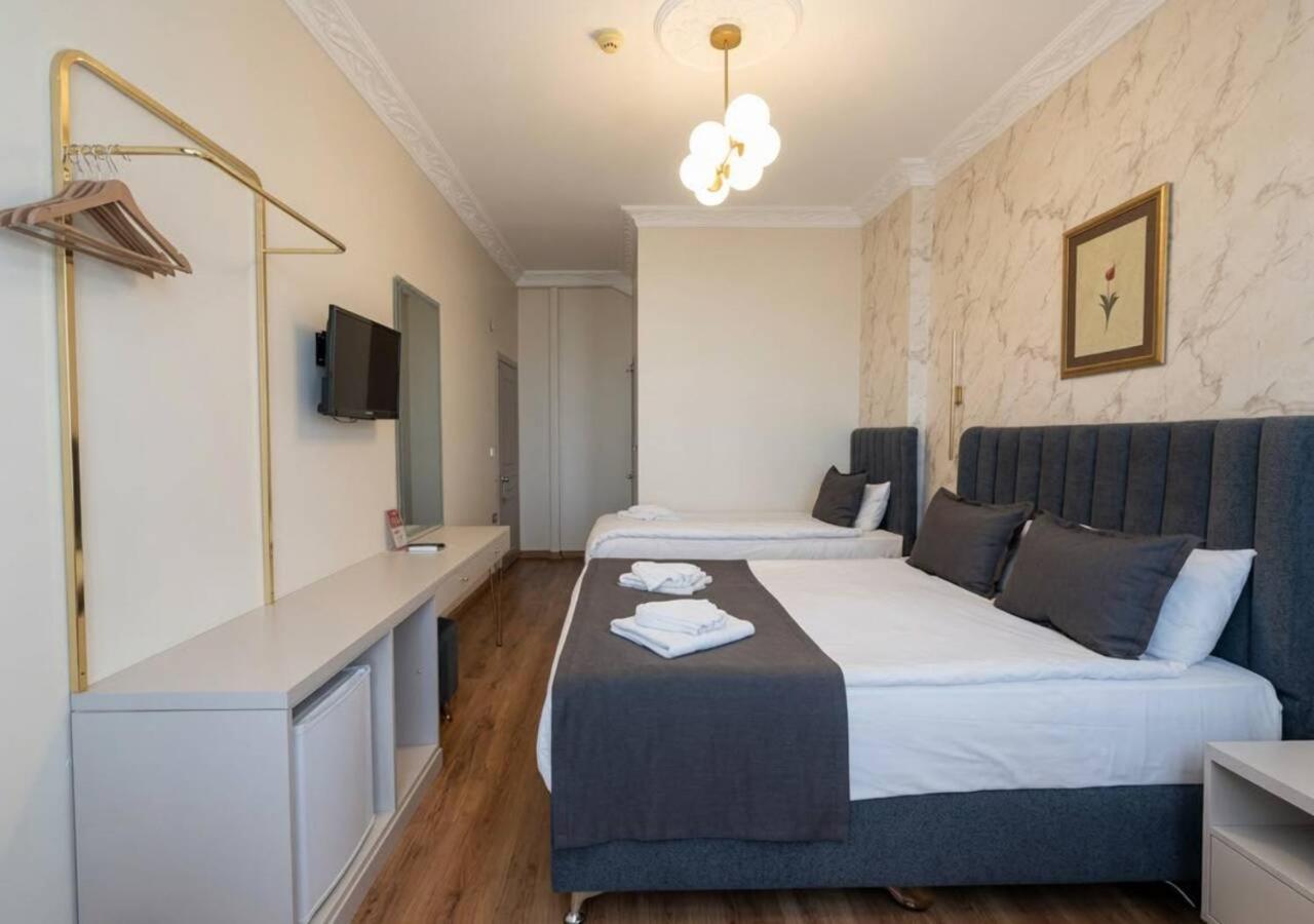 Chambre Triple Deluxe - Vue sur Mer