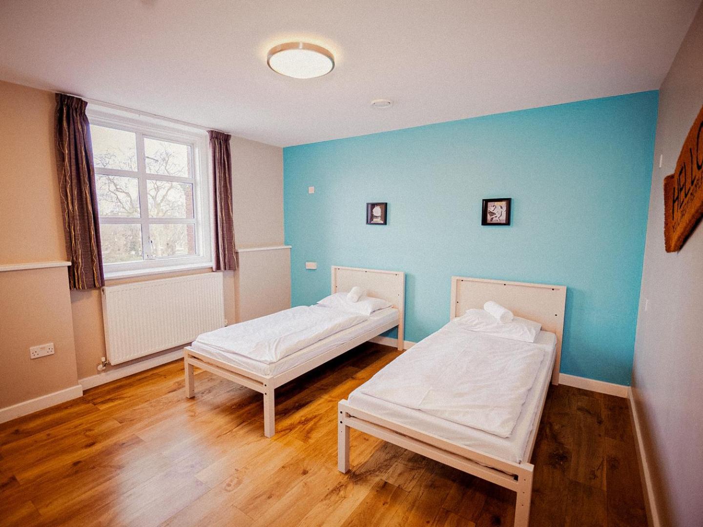 Chambre Lits Jumeaux avec Salle de Bains Privative