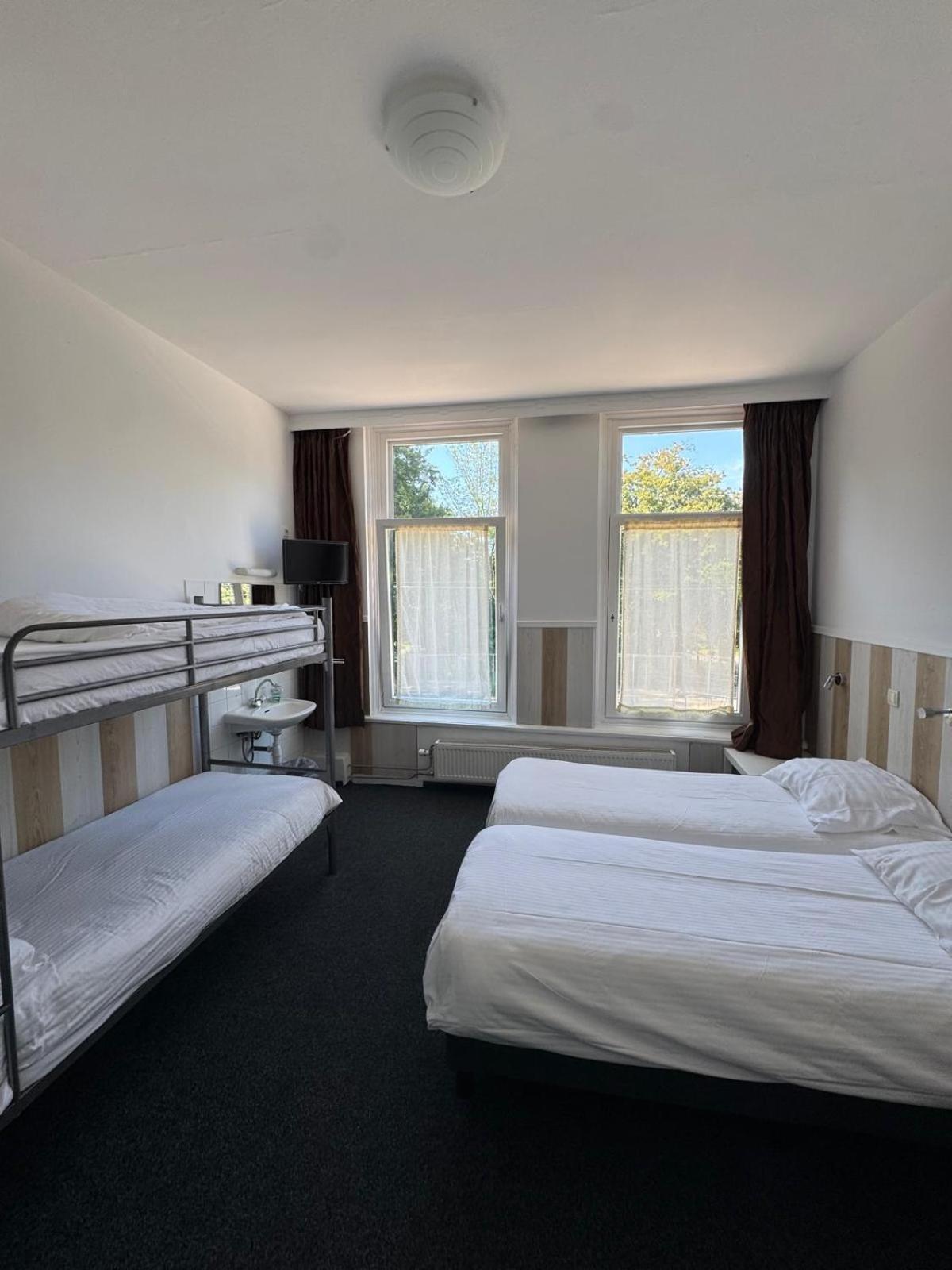Chambre Quadruple avec Salle de Bains Privative