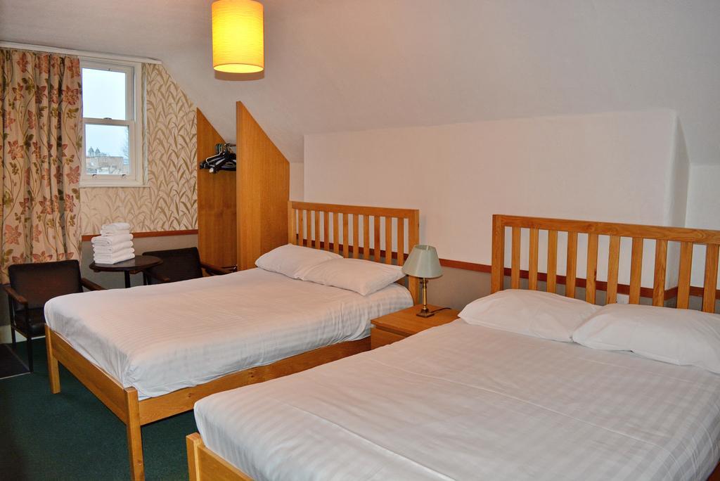 Chambre Quadruple avec Salle de Bains Commune