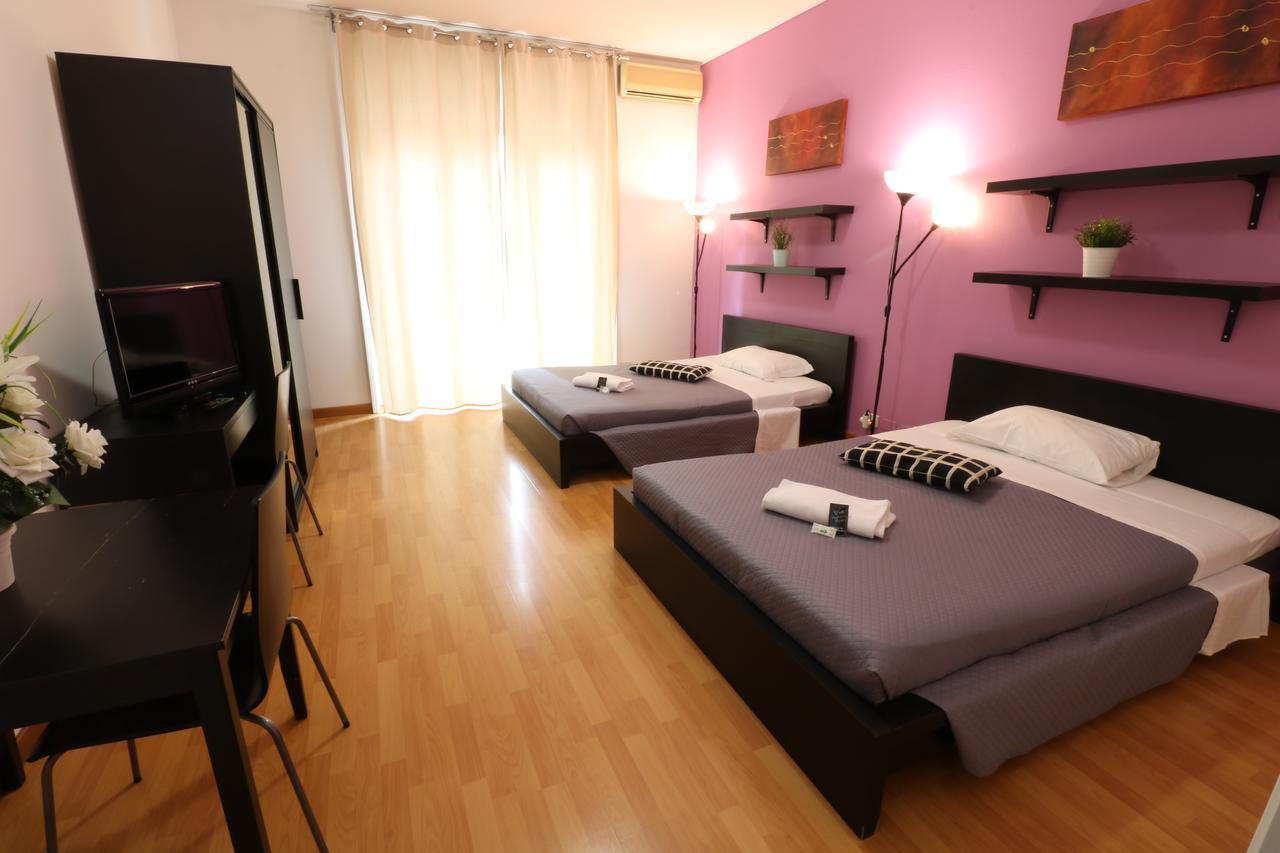 Chambre Lits Jumeaux avec Salle de Bains Commune externe