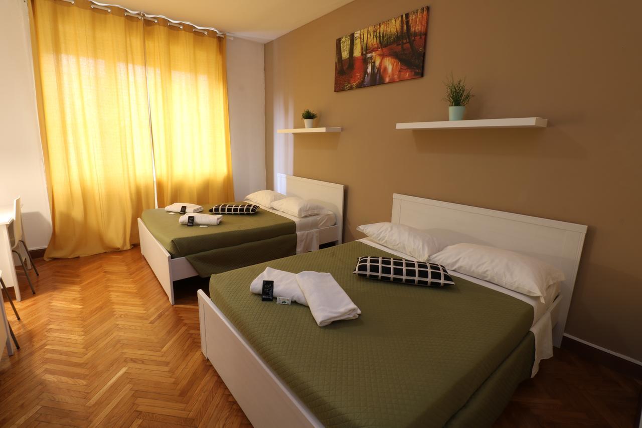 Chambre Quadruple avec Salle de Bains Commune Séparée