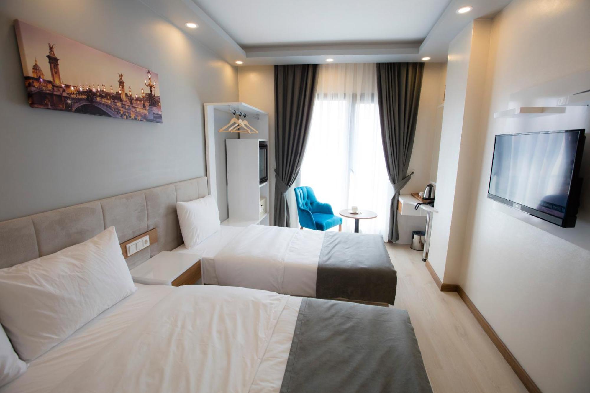 Chambre Deluxe Double ou Lits Jumeaux
