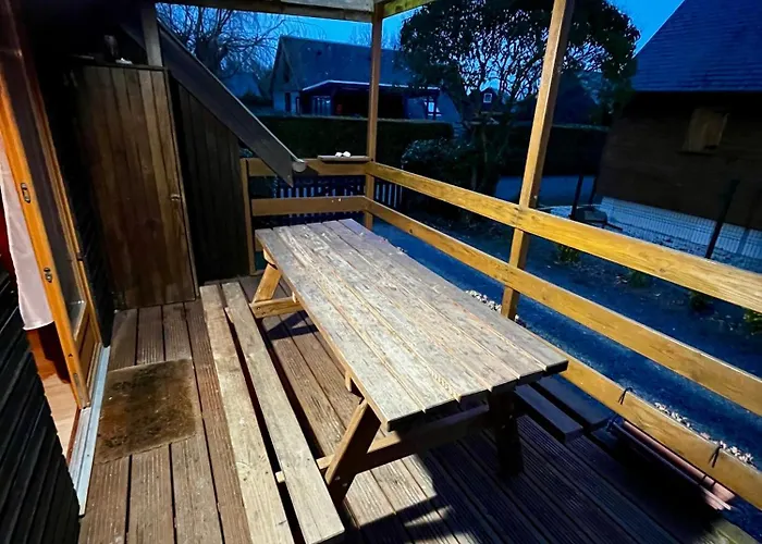 Agréable chalet dans un site protégé avec terrasse, piscine et tennis Cabourg