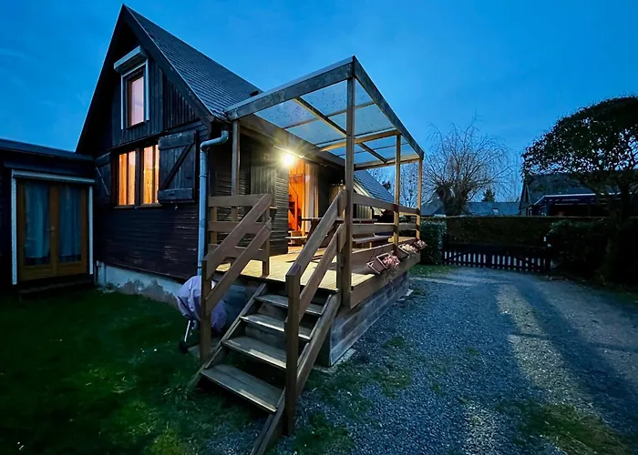 Agréable chalet dans un site protégé avec terrasse, piscine et tennis Cabourg